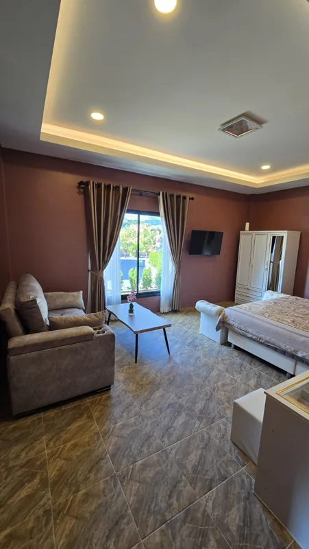 Mekong & Lanna Bungalows · Bedroom & living area